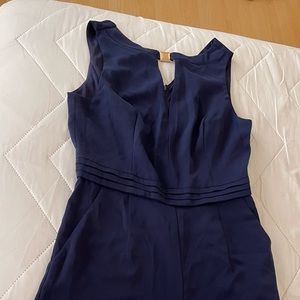 Blue jumpsuit with gold detail